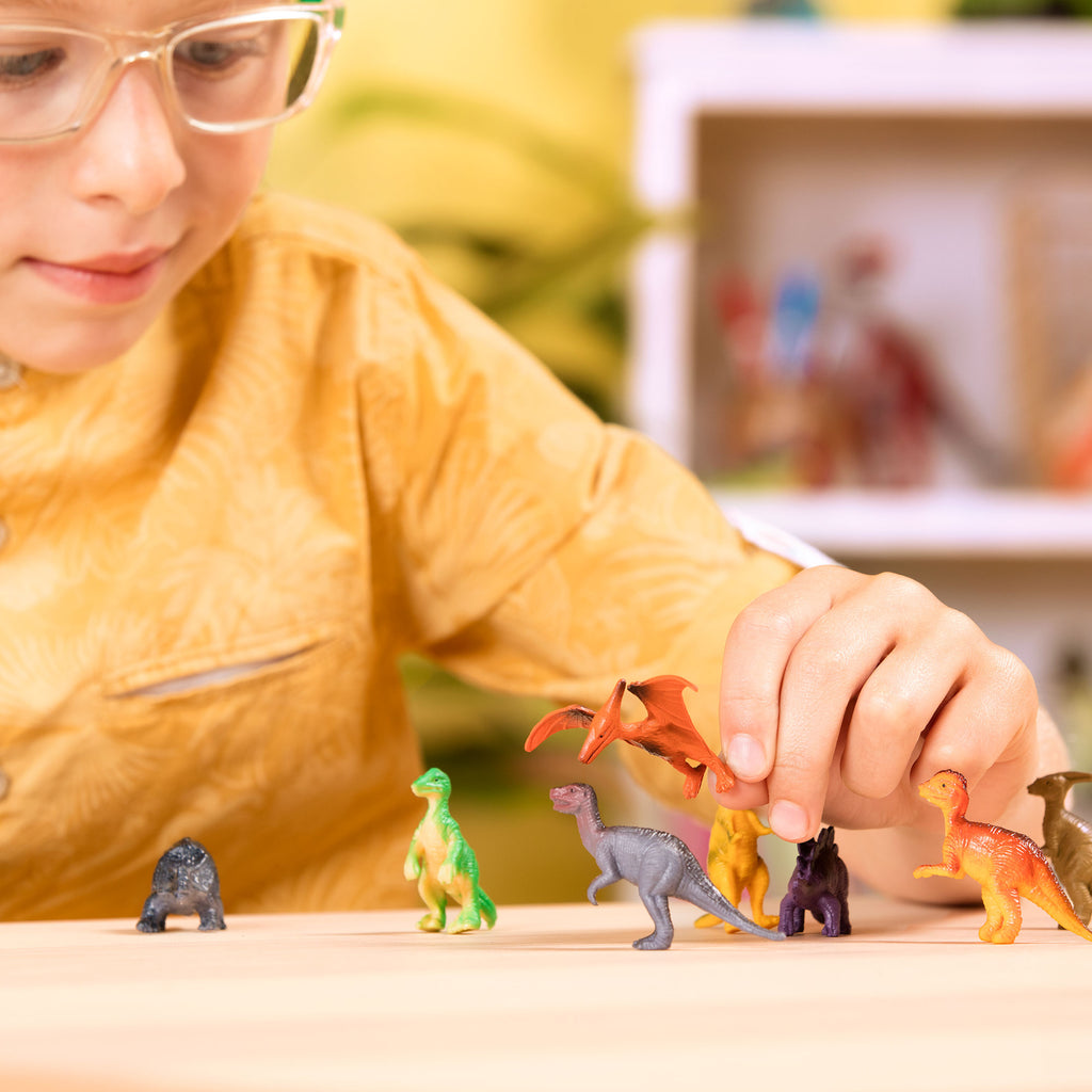 Set dinosaurios en tubo